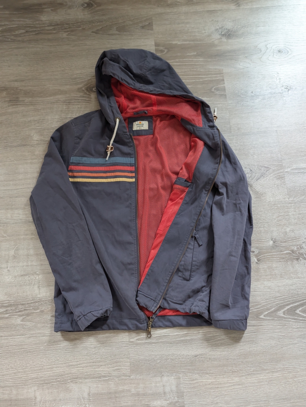 Marine layer's Vintage Howell Hooded Windbreaker Jacket in Navy with Red Lining